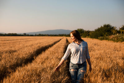 Woman standing on field