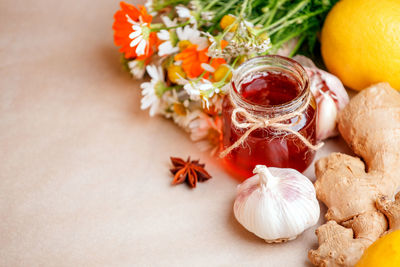 High angle view of orange flowers on table