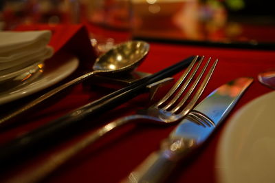 Close-up of silverware on table