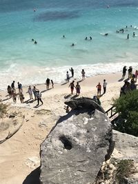 High angle view of people on beach against sky