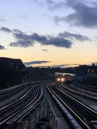 High angle view of train against sky at sunset