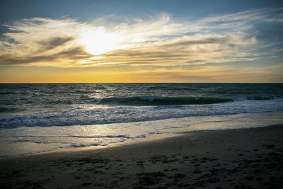 Scenic view of sea at sunset