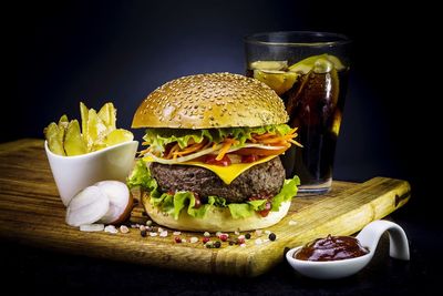 Close-up of drink in bowl against black background