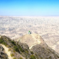 Scenic view of landscape against clear blue sky