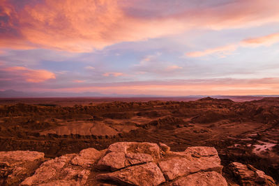 Scenic view of landscape against sky during sunset