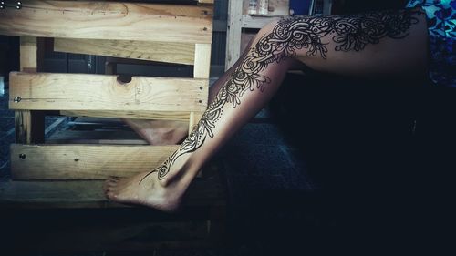 Low section of woman standing on floor