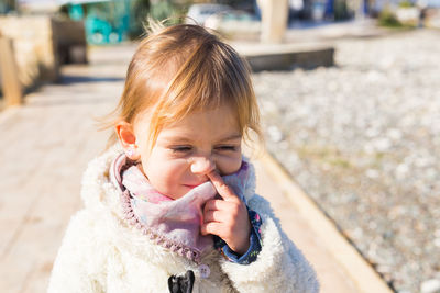 Portrait of cute girl outdoors