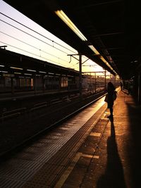 People at railroad station platform