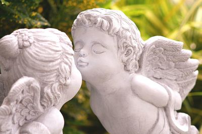 Close-up of angel statue in park