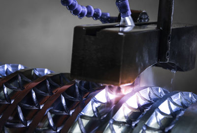 Close-up of person holding machine