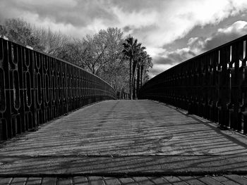 Footbridge against sky