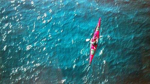 High angle view of people on boat in sea