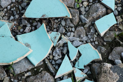 High angle view of stones on field