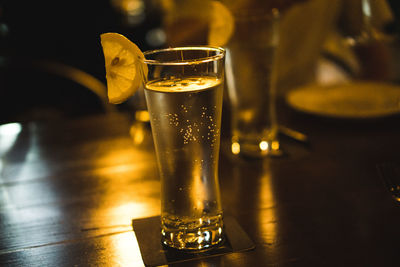 Close-up of beer glass on table