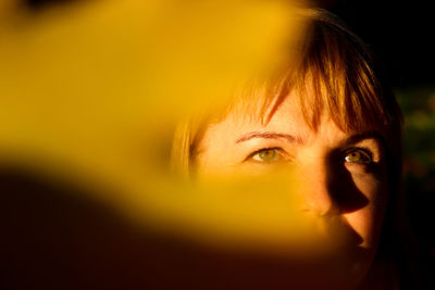 Close-up portrait face of young caucasian blonde woman in autumn. bright stylish woman in abstract 