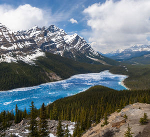 Scenic view of snowcapped mountains against sky