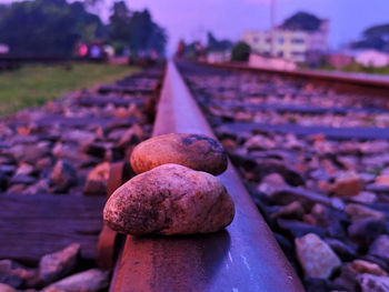 Close-up of stone on railroad track