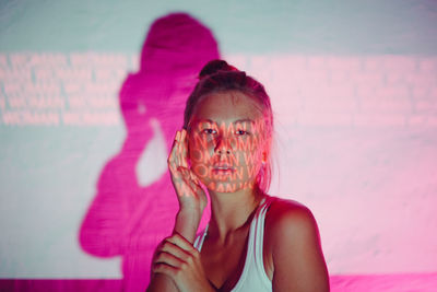 Portrait of woman with pink hair