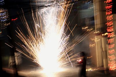 Firework display at night