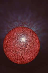 Low angle view of illuminated moon against sky