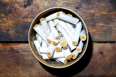 Directly above shot of cigarette on table