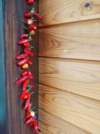 High angle view of candies on wooden table