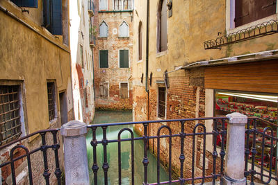 Alley amidst buildings in city