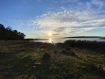 Scenic view of sea against sky during sunset