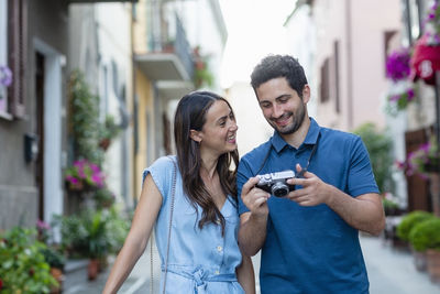 Young couple standing outdoors