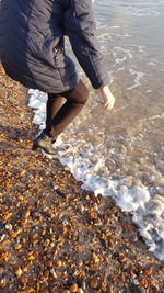 Low section of man on beach