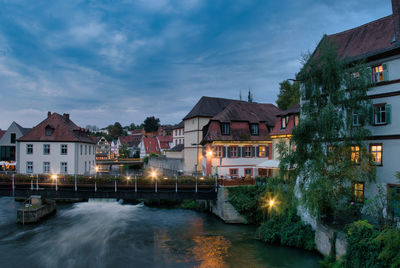 Bridge over river against sky