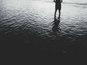 Reflection of people in water