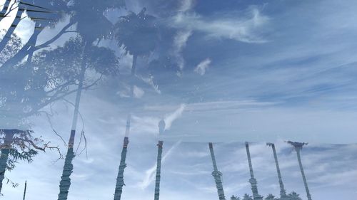 Low angle view of icicles against sky