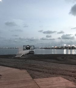 Pier over sea against sky