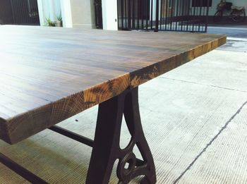 Low section of person on wooden table