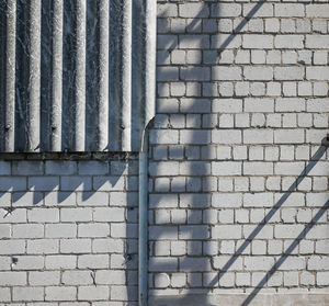 Low angle view of brick wall