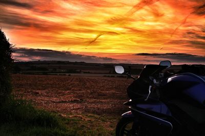Car on road against sky during sunset