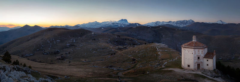 Scenic view of mountains against sky during sunset