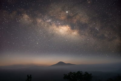 Scenic view of star field against sky at night