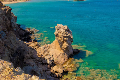 High angle view of rocks on beach