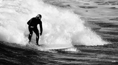 Man surfing in sea