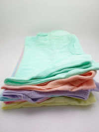 Close-up of colored pencils against white background