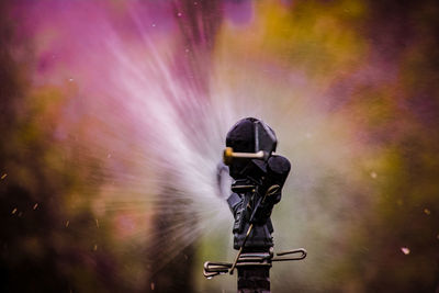 Close-up of sprinkler spraying water