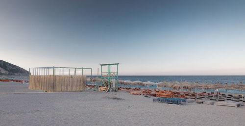 Scenic view of beach against clear sky