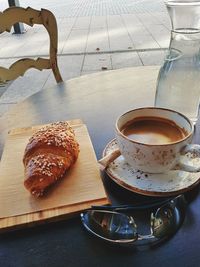 Close-up of coffee cup on table