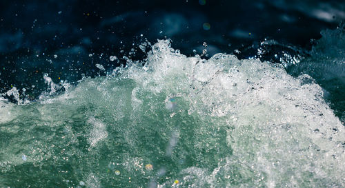 Close-up of water splashing in sea