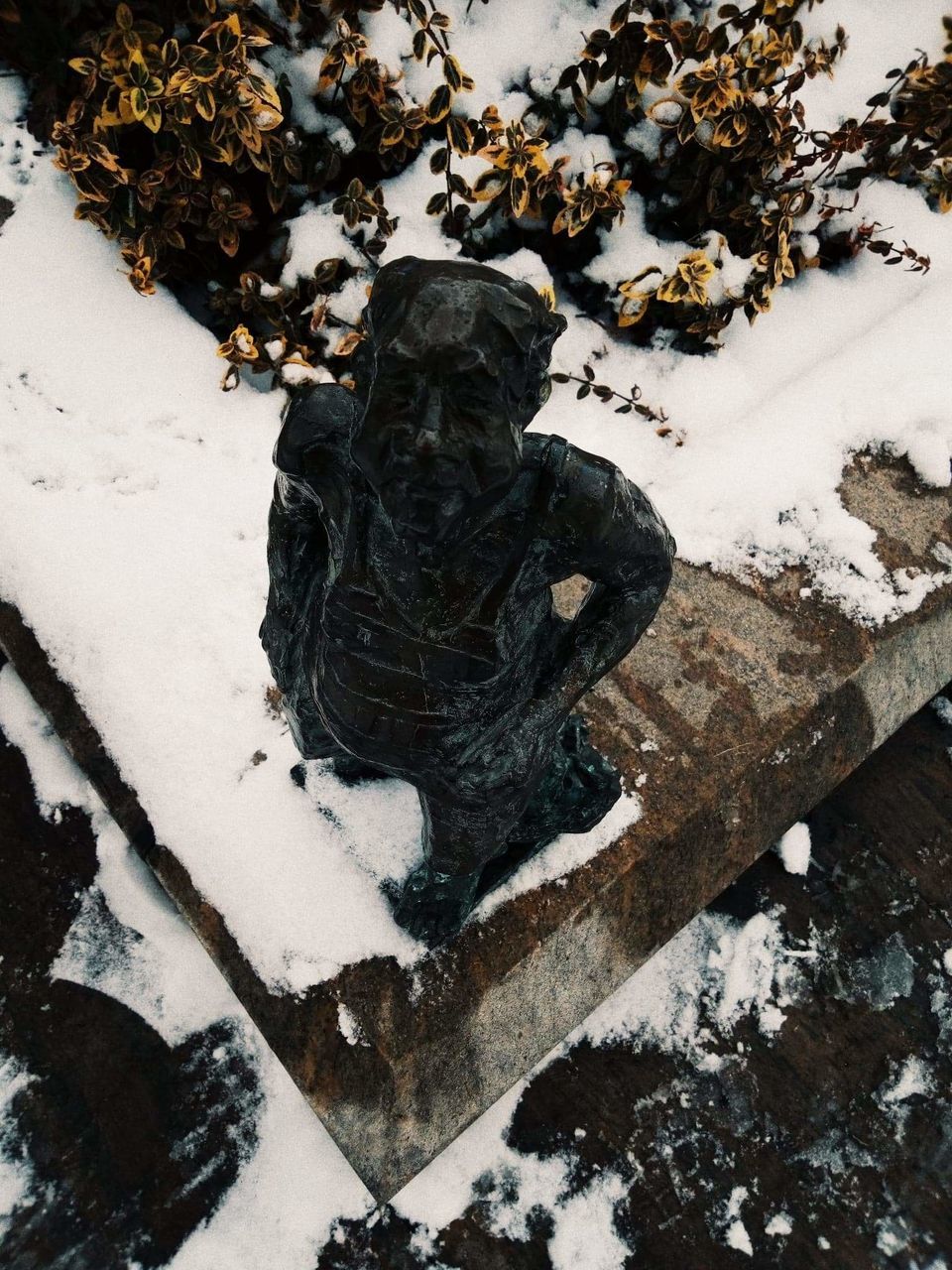 winter, snow, cold temperature, art and craft, sculpture, representation, no people, day, statue, human representation, nature, creativity, covering, high angle view, male likeness, frozen, white color, outdoors, close-up, warm clothing