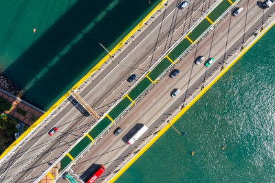 High angle view of vehicles on road amidst field