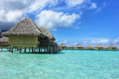 Scenic view of calm sea against blue sky