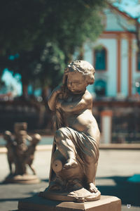 Statue of angel in city